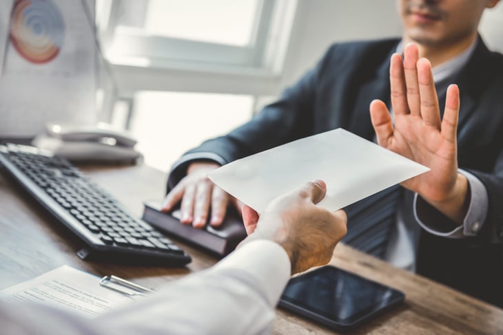 Businessman says no or declines a rejected application for a mortgage or loan or insurance