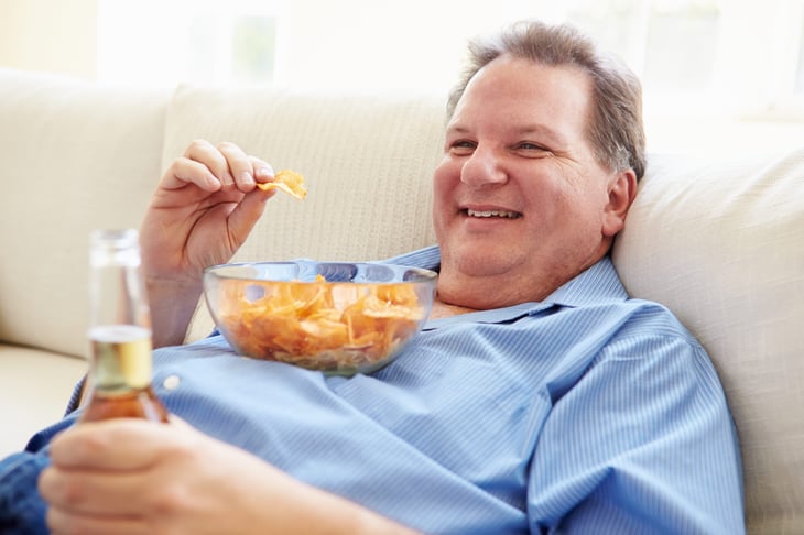 Man eating chips