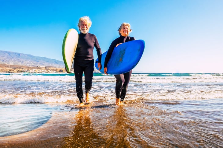 Senior Couple Surfing