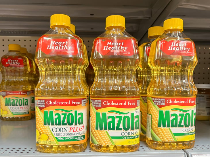 Mazola corn oil on a grocery store shelf