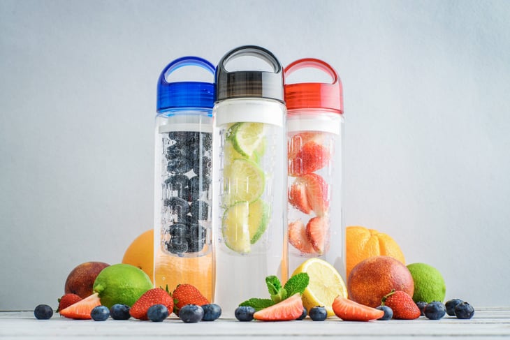 Reusable water bottle with infuser for fruit