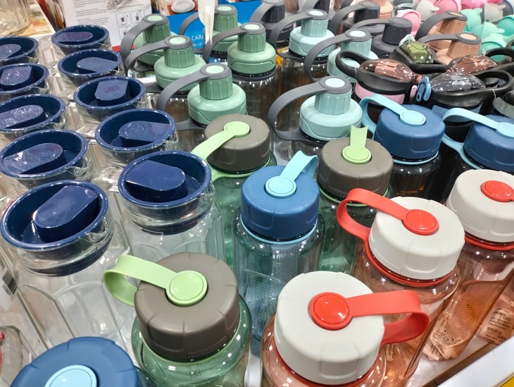 A large collection of reusable water bottles