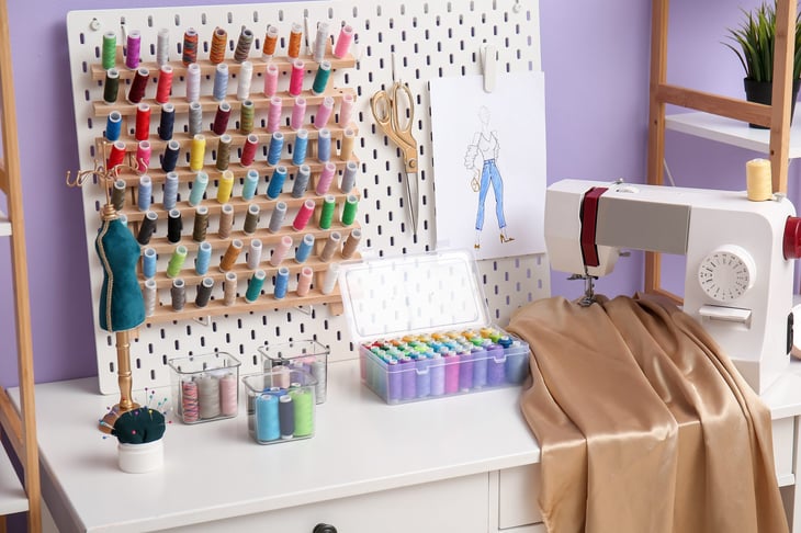 Pegboard with organized sewing supplies