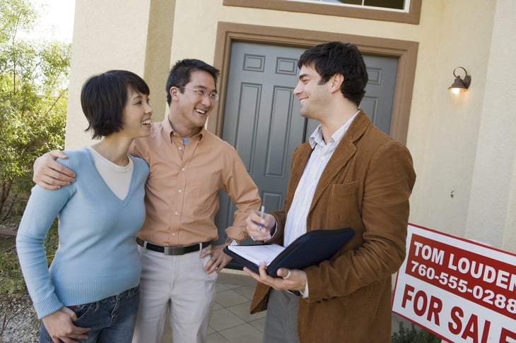 Couple looking at a home for sale