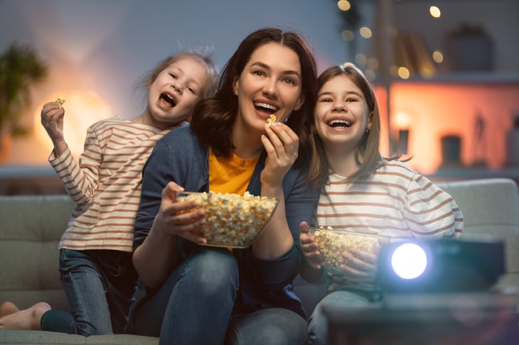 Family at home watching movies
