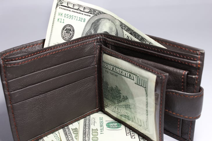 Wallet stuffed with excess cash