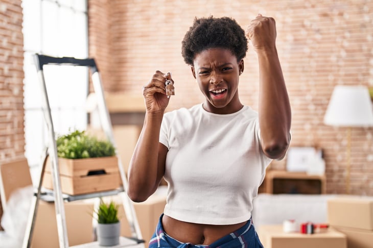 Happy Generation Z homeowner