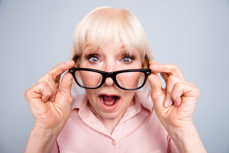 surprised woman with glasses