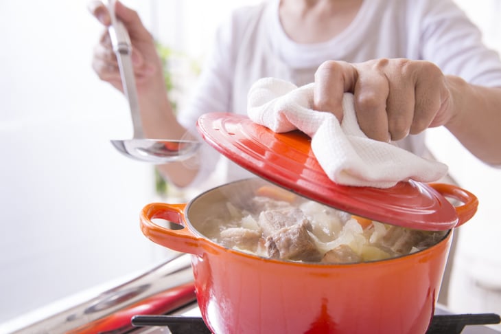 cooking soup in a enameled cast iron pot