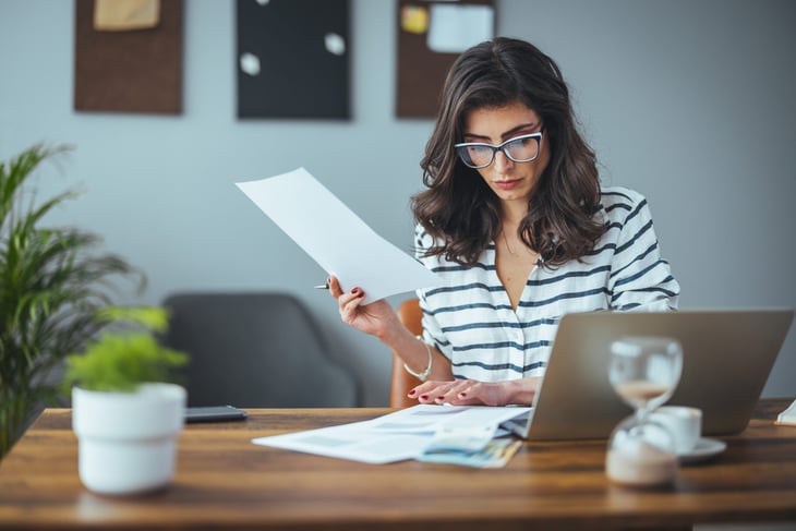 Woman doing taxes business planning