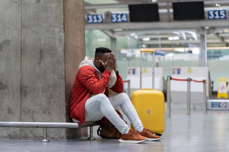 man upset at airport