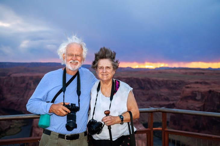 Happy senior couple photographers in Arizona at Horseshoe Bend