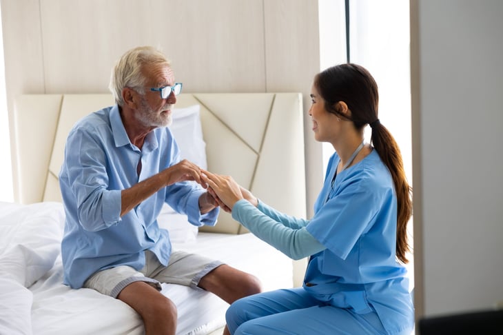 Senior man with caregiver
