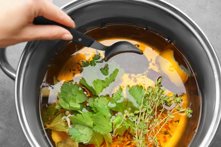 Pot with oil and spices for brine