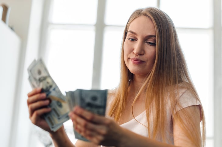 Woman counting money