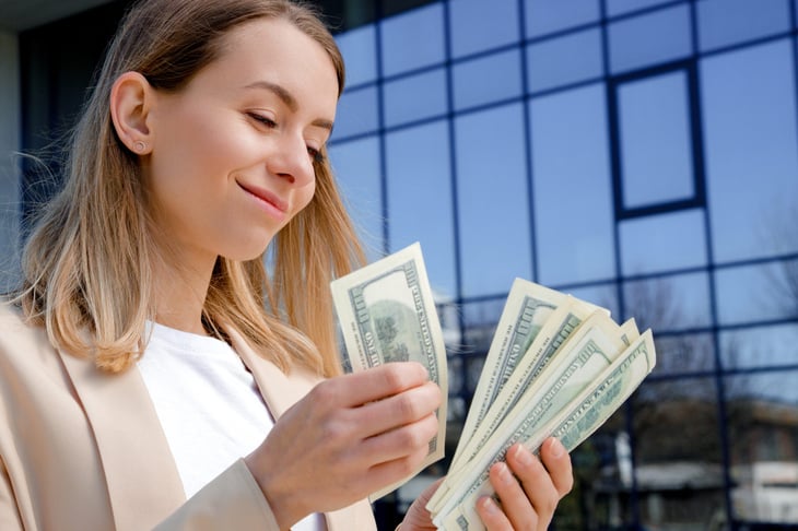 Professional woman counting money