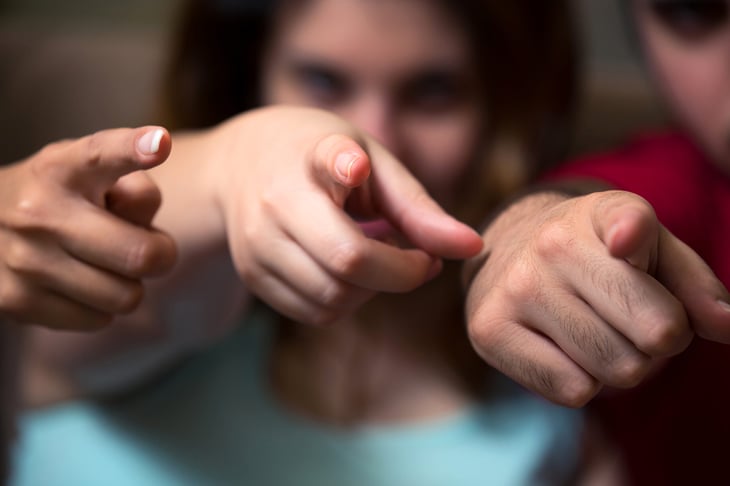 People pointing fingers