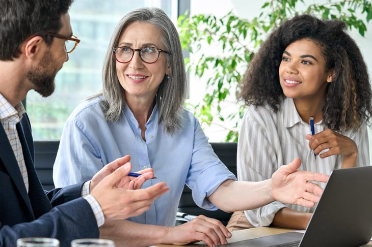 Co-workers in a discussion