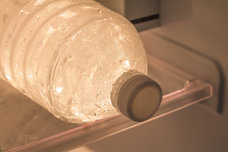 Frozen bottle of drinking water