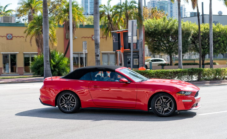 Red Ford Mustang convertible sports car circa 2021