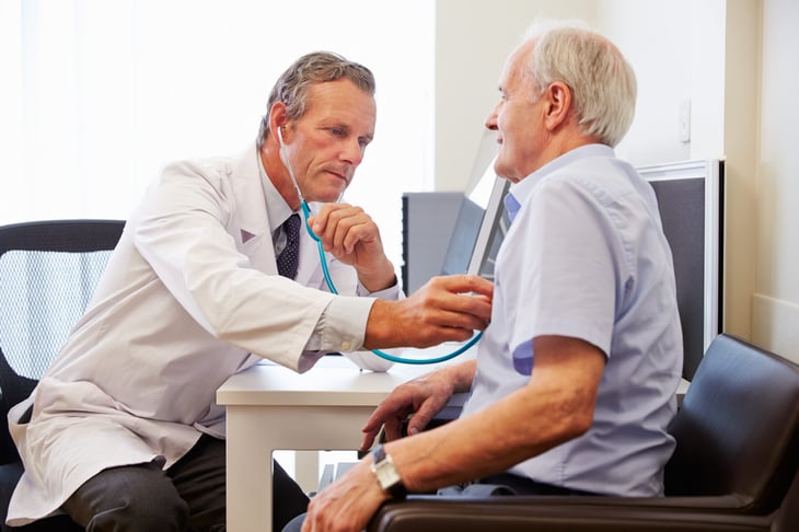 Senior man with doctor