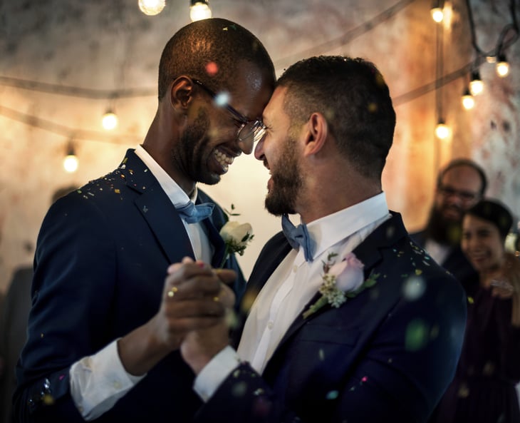 Newly married couple dancing at their wedding