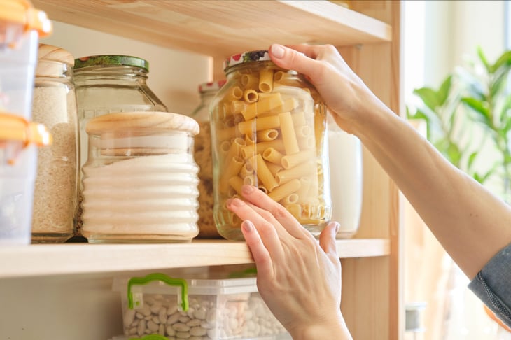 Jar of pasta on the shelf in the pantry