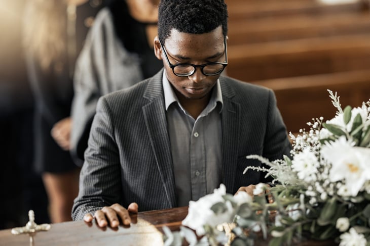 Man with casket