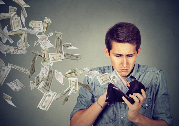 Money flying out of wallet