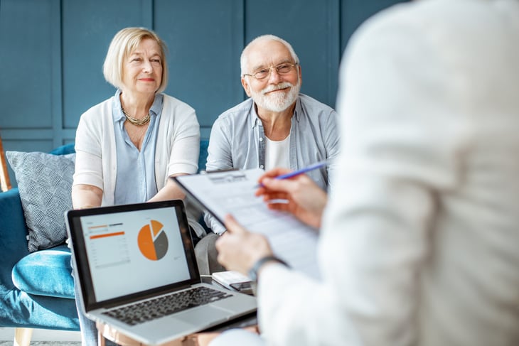 Retirees with financial adviser