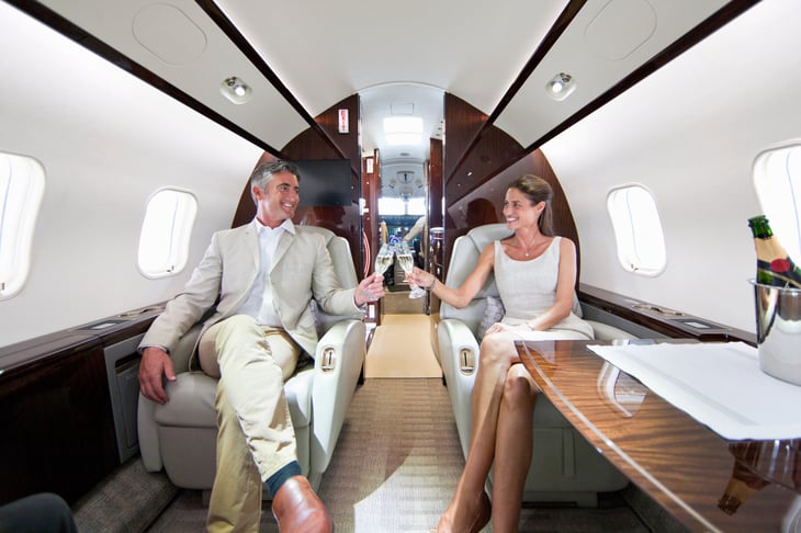Wealthy couple on plane