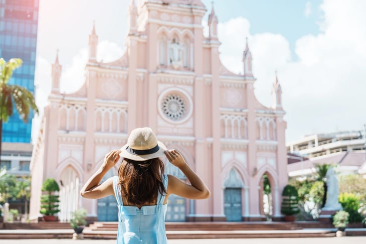 Traveler in front of Da Nang Cathedral in Vietnam.