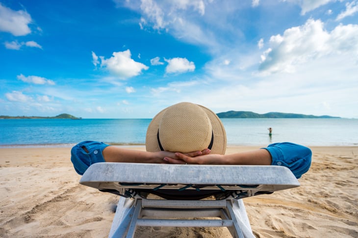 Woman lounging on the beach