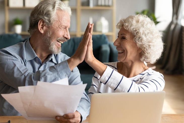 Couple high-fiving