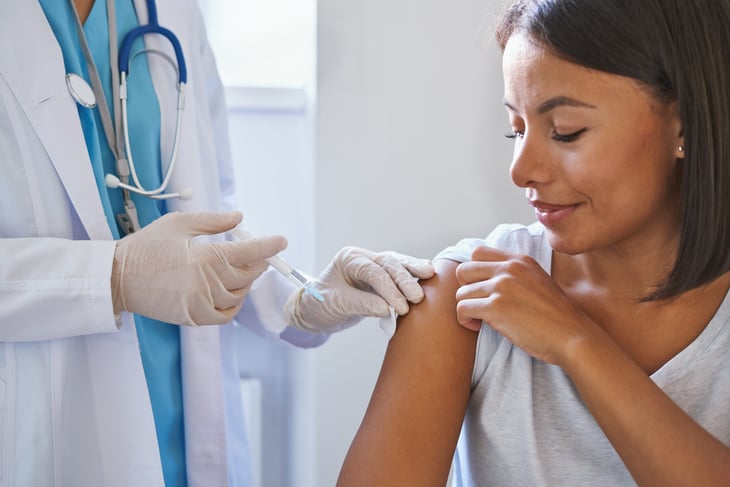 Woman getting a flu shot