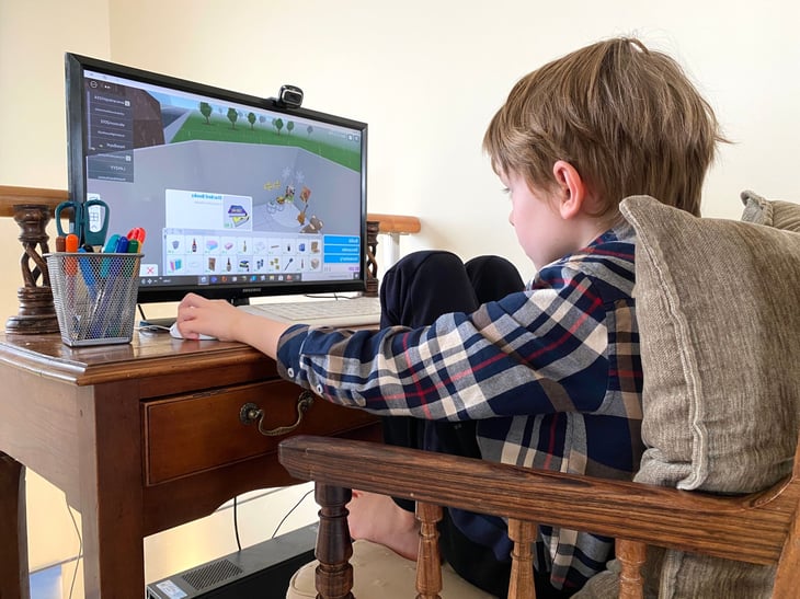 Child playing Roblox