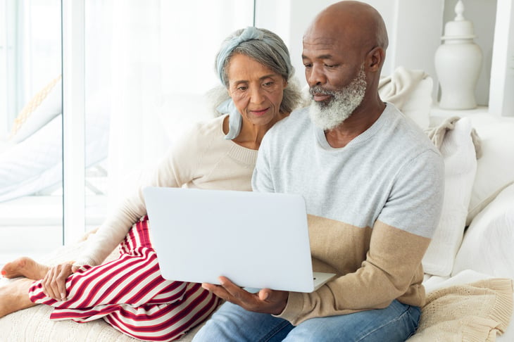 older couple looking at computer