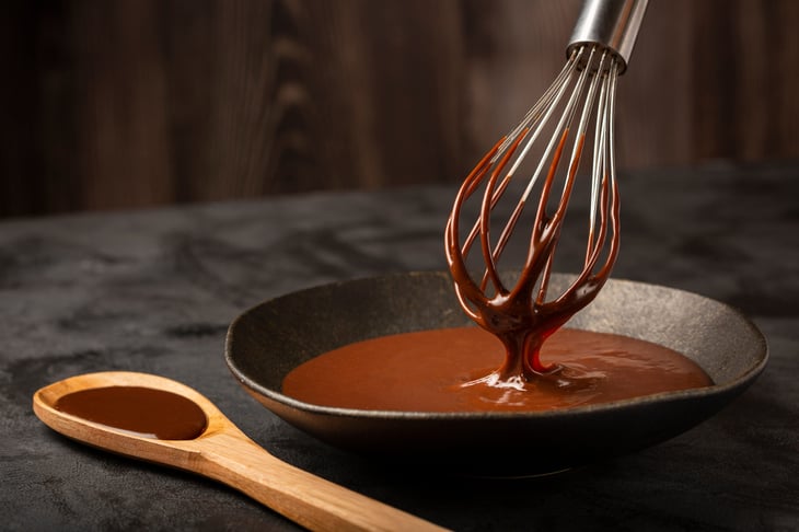 Homemade chocolate syrup in a pan