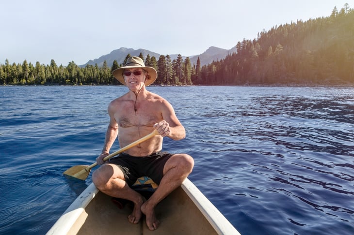 man in canoe on Lake Tahoe