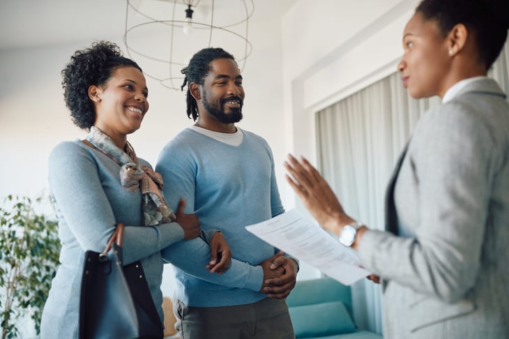 Couple with a real estate agent