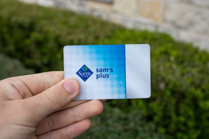 San Antonio, TX / USA - Mar. 03, 2020: A hand holds a Sam's Club Plus Member membership card
