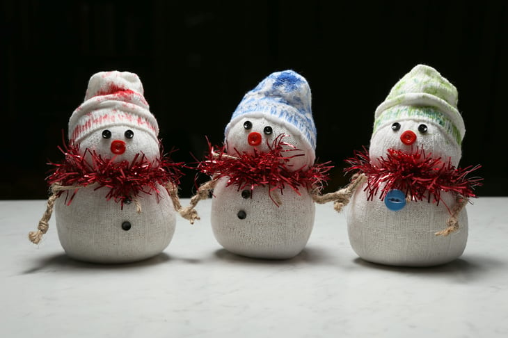Three homemade sock snowmen