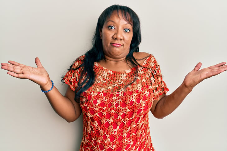 Confused middle-aged woman