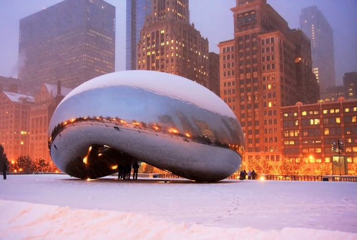 Snowy night in Millennium Park, Chicago, near Cloud Gate sculpture