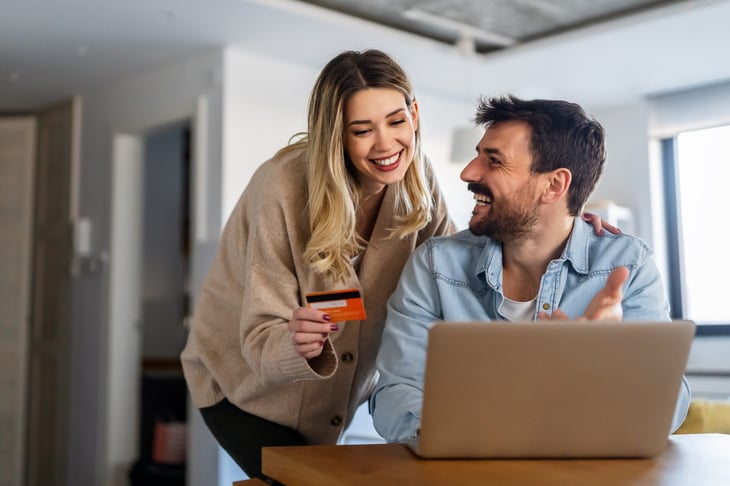 happy couple shopping online