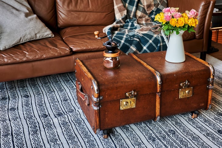 Vintage trunk used as a coffee table with storage in the living room