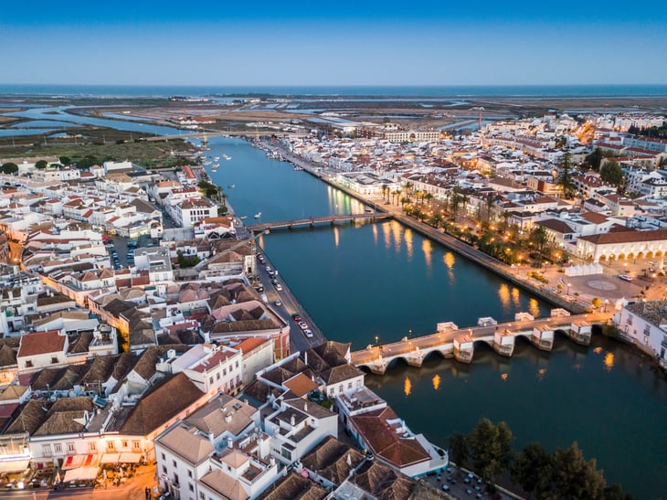 Aerial cityscape of Tavira with bridge over Gilao river in Algarve, Portugal