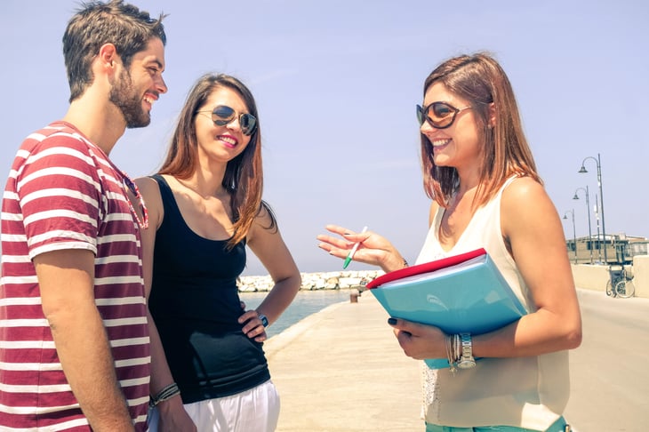 Young couple homebuyers with real estate agent