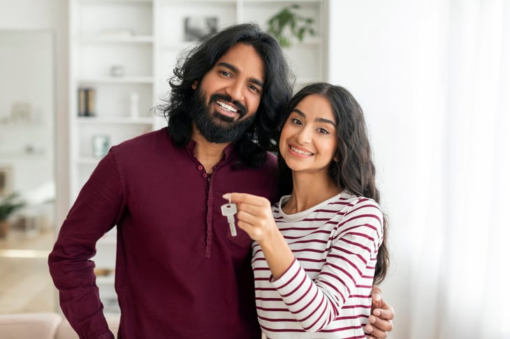 Happy homeowner young couple