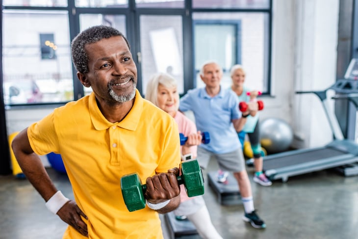 Senior man working out in the gym.